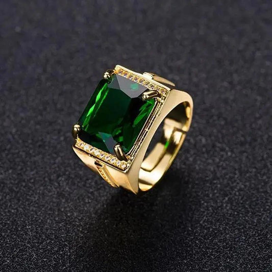 Emerald Gemstone Ring on a dark gray background