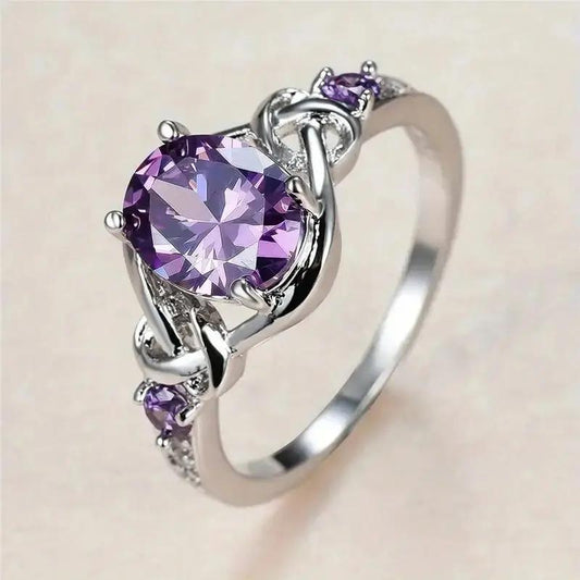Purple Gemstone Ring on a beige background